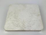 a laptop computer sitting on a table with a white background