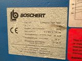 a sign on a blue machine that says boschert