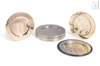 three plates and a silver plate on a white background