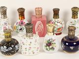 a lot of small vases that are sitting on a table