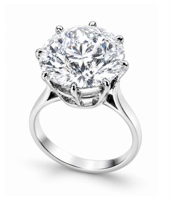 a close up of a diamond ring on a white background