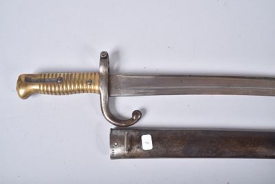 a knife that is laying on a table