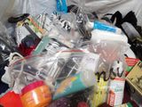 a pile of items that are sitting on a bed