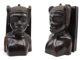 pair of african carved wood bookends of a woman and a man