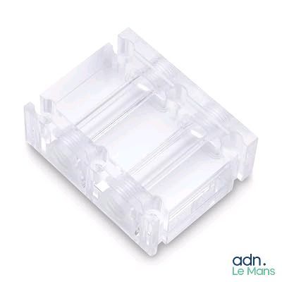 a close up of a clear plastic object on a white background