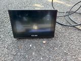 an image of a television sitting on the ground