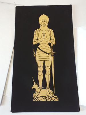 une carte sur laquelle figurent un chevalier et un chien