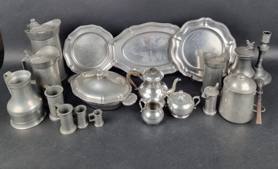 a lot of silver items that are sitting on a table