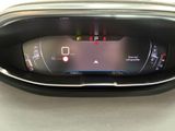 the dashboard of a car with a digital display on it