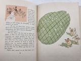 an open book with a picture of a cartoon on it