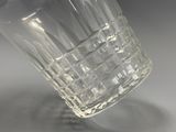 a glass that is sitting on a table