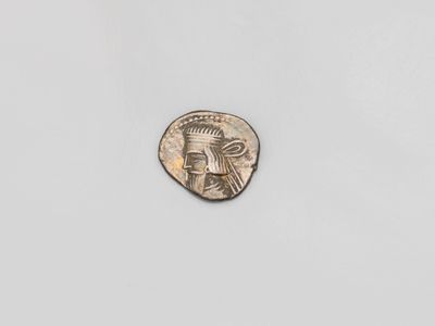 Drachme d'argent antique, buste à tête nue et archer assis, … - Photo 1