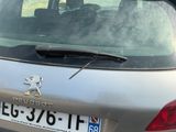 a silver car parked on the side of the road