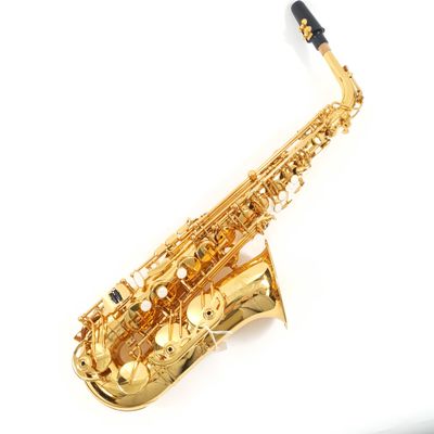 saxophone on a white surface with a white background
