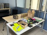 a table with many items on it in a room