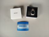 a box with a watch inside of it and a box with a watch inside of it