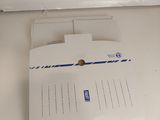 a box of mail sitting on top of a counter