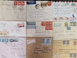 many different types of letters and envelopes on the table