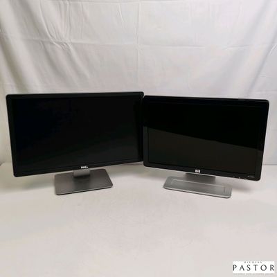 two computer monitors sitting side by side on a table