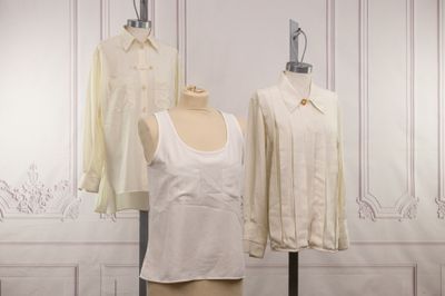 two mannequins that are on display in a room