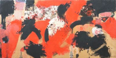 peinture abstraite réalisée à l'aide de peinture noire, rouge et blanche sur un mur