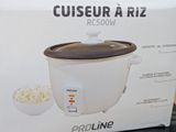 boxed box of a rice cooker sitting on top of a table