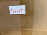a cardboard box with a sticker on it that says swag