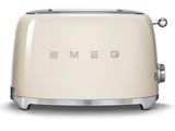 grille-pain de couleur crème arborant le logo Smeg sur fond blanc