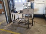 an image of a metal work bench in a factory