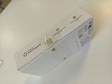 a box that is sitting on a table next to a keyboard