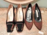 three pairs of women ' s shoes are lined up on a counter