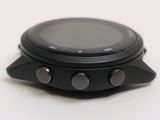a close up of a smart watch on a white surface