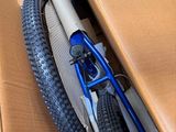 a bike that is sitting in a box on the floor