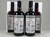 trois bouteilles de rhum vieilli Hampdden devant une boîte blanche