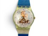 a watch that has a picture of a woman on it
