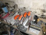 many tools that are sitting on a table in the room