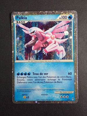 pokemon card with a pink and white pokemon character on it