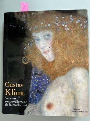a book with a picture of a woman in a blue dress