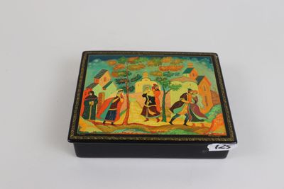 an image of a box with a painting on it on a white surface