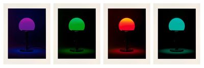 a set of four different colored lights in different colors
