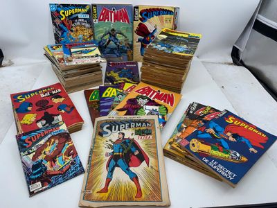 a lot of comic books that are on the table