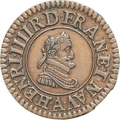 an old coin with a bust of a man on it
