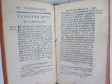 an open book that is sitting on a table