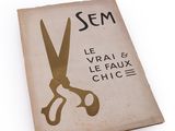 a book with a picture of a pair of scissors on it