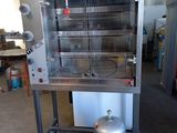 une photo d'un four professionnel équipé d'un brûleur au propane