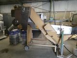 a picture of a machine that is sitting in a warehouse