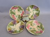 three plates and a cup sitting on top of a table