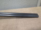 a pair of metal rods sitting on top of a table