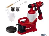 une photo d'un pulvérisateur rouge et blanc et d'outils