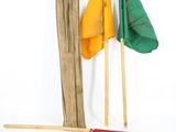 three different colored flags on a white background